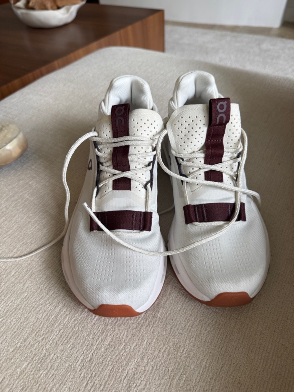 On Running White Sneakers with Burgundy and Gum Soles